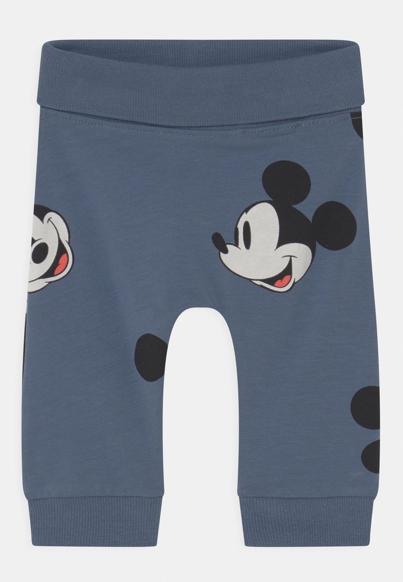 Pantalon bébé bleu avec taille et poignets élastiques, doté de plusieurs visages souriants de Mickey Mouse imprimés sur le tissu.