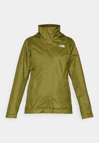Veste imperméable vert olive avec col haut, fermeture éclair avant et bouton-pression, deux poches latérales zippées, logo The North Face sur la poitrine.