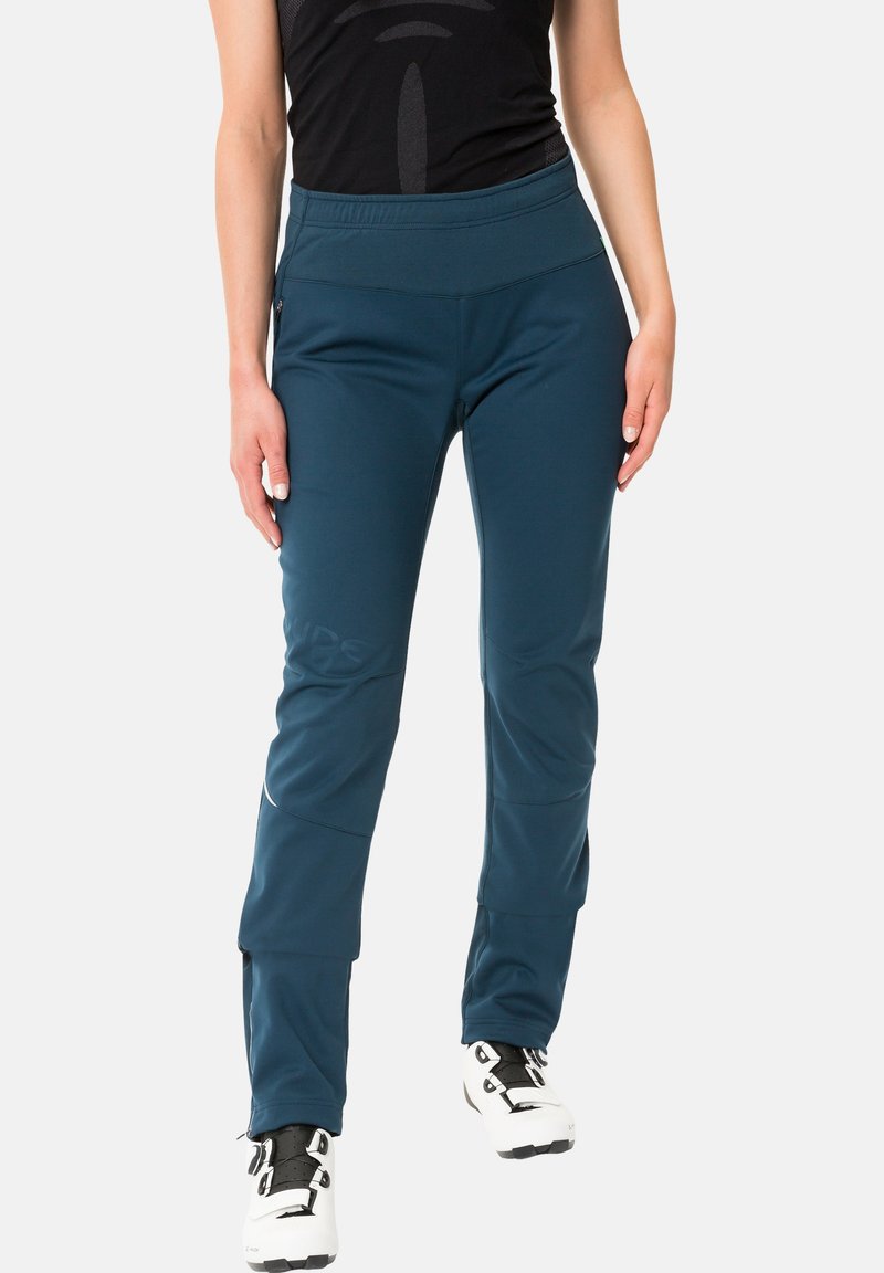 Türausgehose in Türkis aus einem dehnbaren Material. Verfügt über einen hohen Bund und schmal zulaufende Beine mit dezentem Branding. Entworfen für Funktionalität.