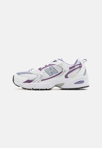 Sneakers feature a white mesh upper with purple and grey accents, rounded toe, cushioned sole, and "ABZORB" branding on the heel.
