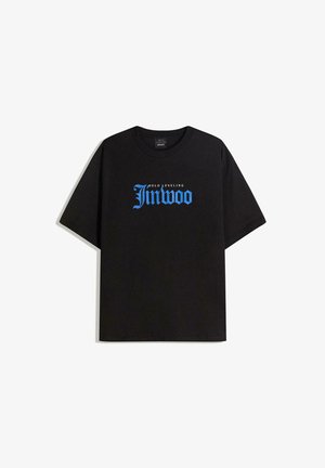 Black cotton t-shirt featuring short sleeves, a crew neckline, and a graphic print in blue and white reading "Solo Leveling Jinwoo."