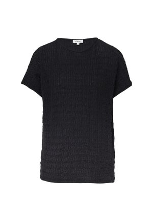 Haut noir à manches courtes en tissu texturé avec un motif en vagues. Encolure ronde et coupe ample, avec des fentes sur les côtés pour plus de confort.