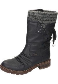 Damen-Knöchelschuh aus schwarzem Leder mit einem gestrickten grauen Bund. W verfügt über dekorative Nähte, seitliche Schnürung und eine strukturierte Gummisohle.