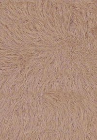 Primer plano de fibras de alfombra beige texturizadas dispuestas en un patrón de remolino, creando una superficie suave y táctil.