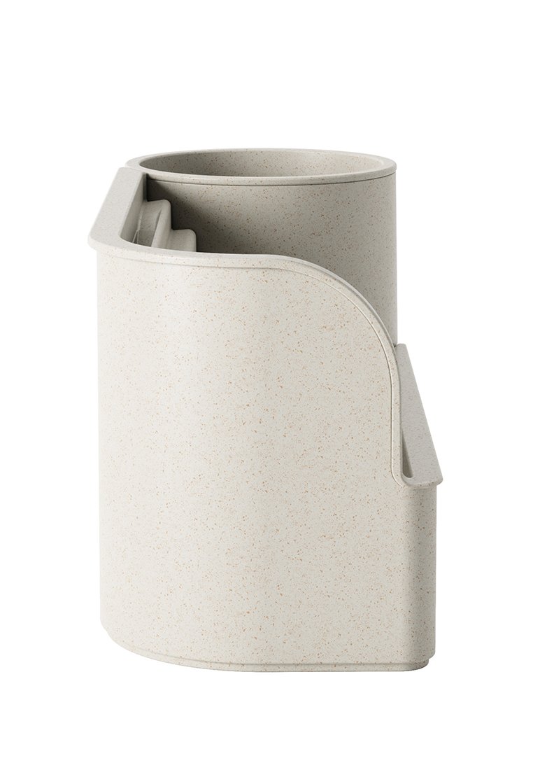 Runder, hellbeiger Organizer aus strukturiertem Material mit glatter Oberfläche; verfügt über drei Fächer und eine abgerundete Kante für ein ästhetisches Design.