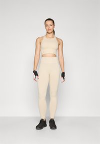 Casall SEAMLESS HIGH WAIST  - Tajice - ecru