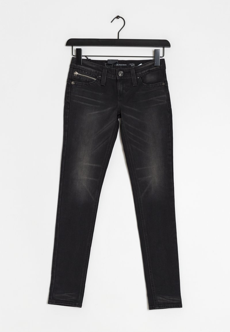 Jean slim noir avec poche zippée et fermeture par bouton, suspendu à un cintre noir sur fond blanc.