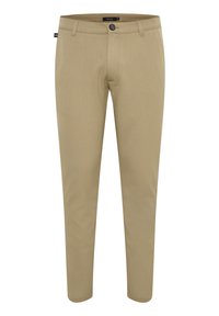 Beżowe, slim-fit spodnie wykonane z gładkiego materiału, z zapięciem na guzik, szlufkami na pasek i subtelną teksturą, zaprojektowane do codziennego noszenia.