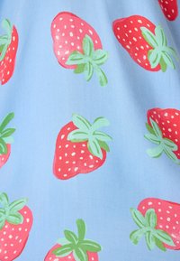 Blue fabric featuring a repeated pattern of red strawberries with green leaves, displaying dot details for the seeds.