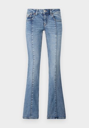 Heledsinine teksapüksid, flared stiilis, viie taskuga disain, nööpkinnitusega ja nähtava õmbluse detailidega jalgadel. Sile tekstuur.