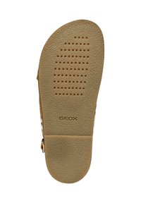 Suela de goma marrón con una superficie texturizada y perforaciones de ventilación; logotipo "GEOX" en relieve; forma redondeada diseñada para la comodidad.