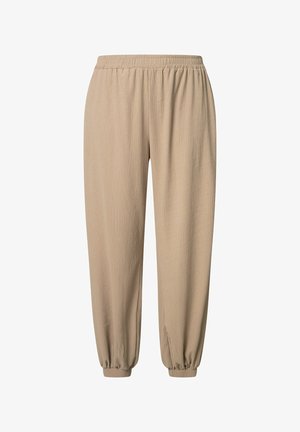 Pantaloni beige morbidi con tessuto testurizzato, vita elasticizzata e polsini elasticizzati arricciati, progettati per un uso casual.
