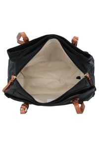 Borsa in nylon nera con manici in pelle marrone; l'interno è in tessuto beige e presenta una tasca con zip su un lato per l'organizzazione.