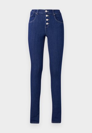 Kapeat farkut tummansinisestä denimmateriaalista, joissa on korkea vyötärö, nappisuljenta viidellä hopeisella napilla ja minimalistiset takataskut.