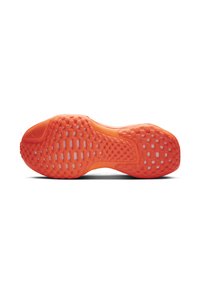 Fényes narancssárga sneaker talp, texturált gumival a tapadás érdekében. Különleges mintázatokkal, bordákkal és sima, tartós felülettel rendelkezik.