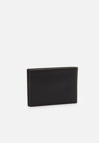 Portefeuille en cuir noir de forme rectangulaire, avec une texture lisse et des coutures minimales. Design compact, sans matériel ou accents visibles.