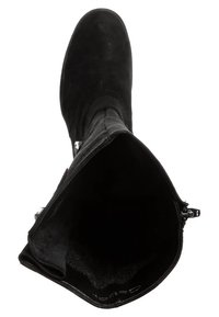 Botte noire en daim montant jusqu'au genou vue de dessus, montrant la fermeture éclair ouverte et la doublure intérieure lisse.