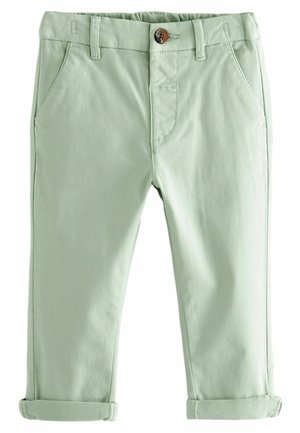 Jasnozielone bawełniane spodnie z przednimi kieszeniami, podwijanymi nogawkami, szlufkami na pasek i brązowym zapięciem na guzik.