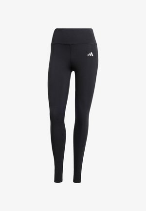 Zwarte leggings van rekbaar materiaal, met een hoge tailleband en een klein wit logo, met een zachte, matte afwerking.