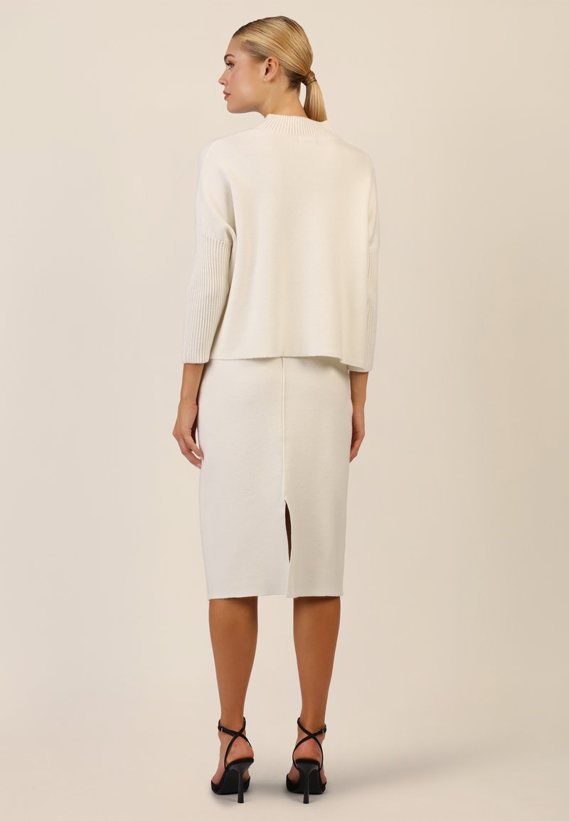 Jupe crayon beige INFLUX – taille 44 – style classique élégant - Vêtements