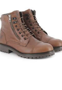 Botines marrones de cuero con cordones, cremallera lateral y suela de goma con dibujo. Presentan detalles de costuras y puntera reforzada.