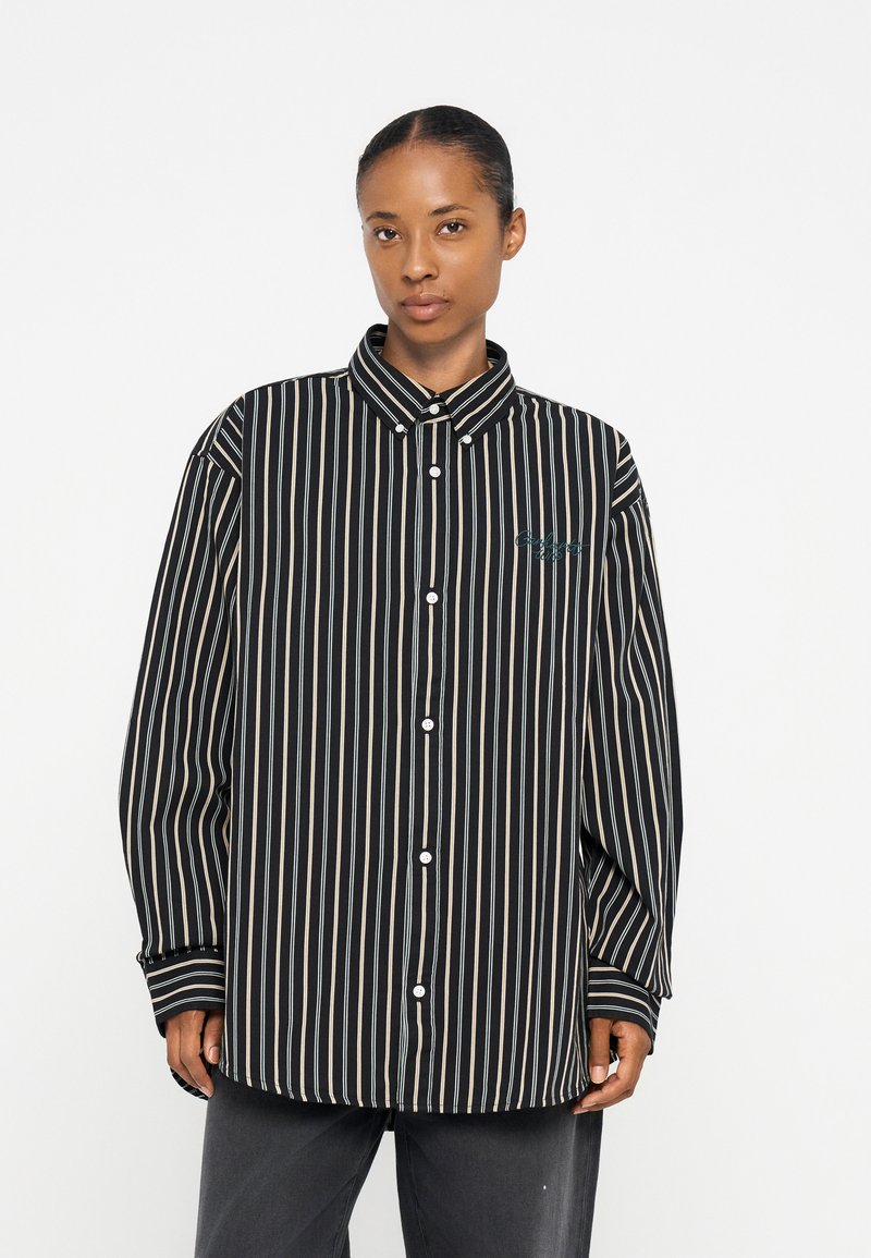 Camisa