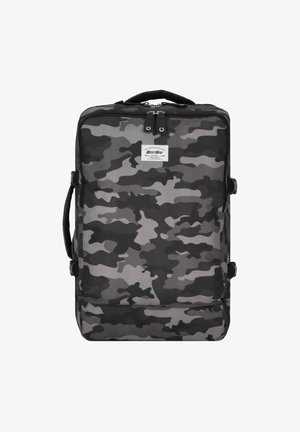 Black and gray camouflage backpack with a rectangular shape, soft fabric texture, dual zipper closure, and side handle. Logo patch on front.