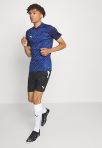 Puma TEAMULTIMATE  - T-shirt print - navy