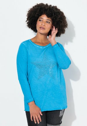 Blaues Langarmhemd aus weichem Stoff, mit einem großen Strassstern-Design auf der Vorderseite und einer lockeren Passform.