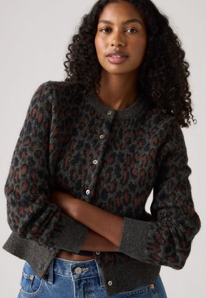 Dark gray cardigan with a leopard print pattern in rust and black. Features a round neckline and button closures, made of a soft textured material.
