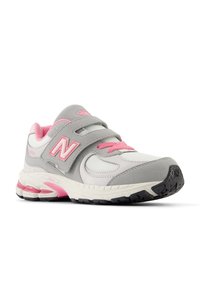 Gray and white athletic shoe with pink accents, Velcro strap, mesh panels, cushioned sole, and textured black rubber outsole.
