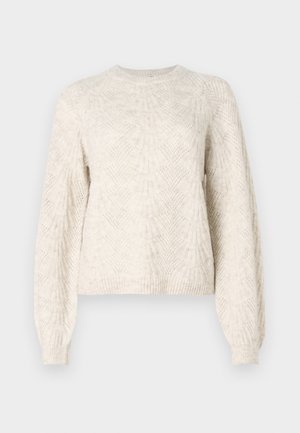 Sweater de punto color crema con patrones texturizados de diamantes y abanicos, mangas largas abullonadas y puños y dobladillo acanalados.