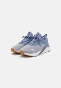 Gray and light blue athletic shoes with mesh upper, textured detailing, and rubber outsole. Features flat laces and padded collar.