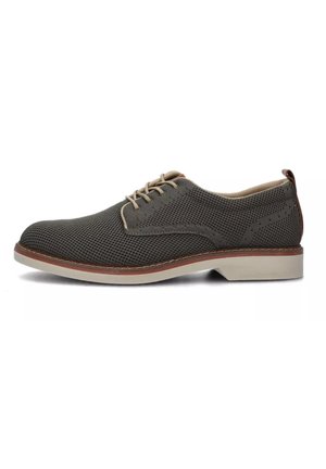 Scarpe da uomo con lacci in rete grigia scura, con una fodera beige, abbinate a una suola in gomma chiara e dettagli di cucitura marrone.
