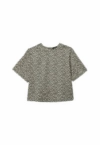 T-shirt à manches courtes en crème avec un imprimé léopard noir et marron. Coupe ample avec un col rond et un tissu texturé.