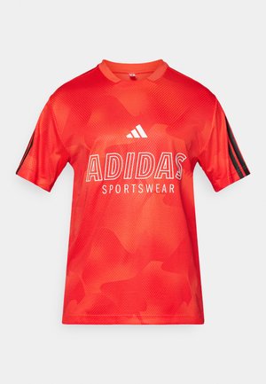 Red short-sleeve sports shirt made of textured fabric. Features black stripes on sleeves, large "ADIDAS SPORTSWEAR" text in white, and crew neck.