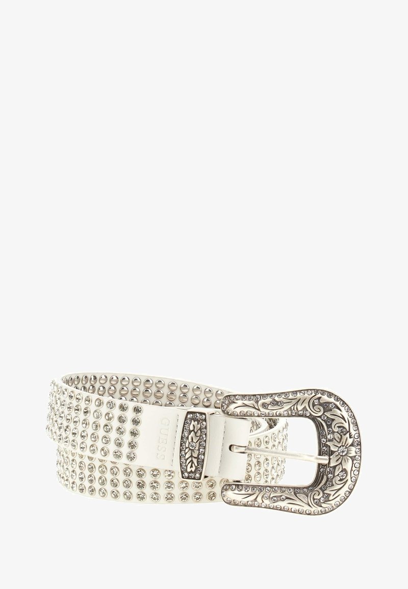 Ceinture blanche cloutée avec boucle en métal argenté ornée d'accents floraux, embellie de multiples strass sur la sangle pour un détail supplémentaire.