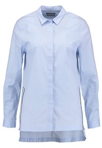 Camicia a maniche lunghe azzurro chiaro con colletto classico, caratterizzata da una vestibilità dritta, una texture liscia e cerniere laterali per un tocco di stile.