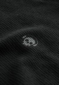 Next SINGLE COSY SET - Pyžamová súprava - black green checkerboard