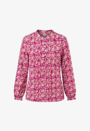 Langærmet lyserød bluse med beige blomsterprint, opsamlede manchetter, plisseret front og fem hvide knapper på en hævet krave.