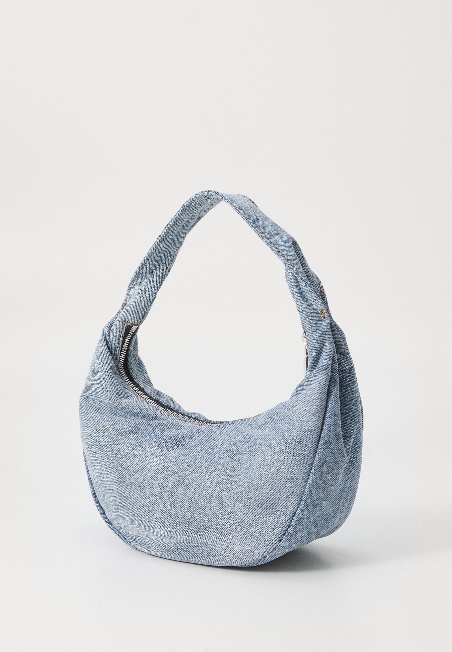 Calvin Klein Jeans SOFT CRESCENT - Handbag - denim/light