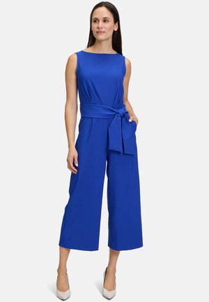 Blue sleeveless jumpsuit with a fitted bodice, wide cropped legs, and a tied waist detail. Fabric appears smooth and lightweight.
