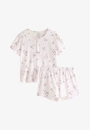 Set pigiama rosa tenue con maglietta a maniche corte e pantaloncini, con piccola fantasia floreale viola e sottili righe verticali, caratterizzato da due fiocchi sul top.