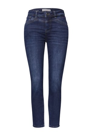 Vaqueros ajustados de color azul oscuro con una textura suave, que cuentan con bolsillos delanteros y costuras decorativas en las caderas. Cierre con botón de metal.