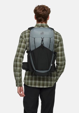 Gray and black backpack with mesh accents, adjustable straps, and a drawstring closure. Textured fabric with a logo on the front.