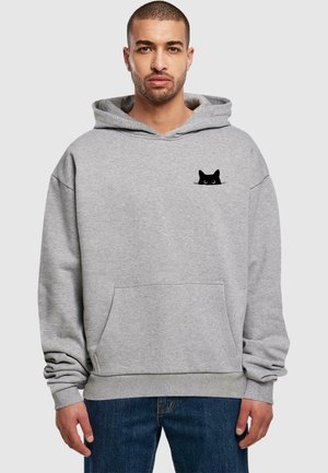 Grey hoodie featuring a front pocket and a black cat graphic on the chest. Made from soft fabric with ribbed cuffs and hem.
