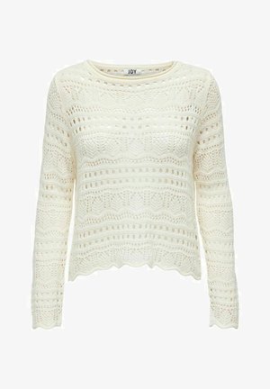 Cremefarvet strikket sweater med et tekstureret mønster med åbne vævninger, lange ærmer og en bølgeformet kant. Designet med en rund halsudskæring.