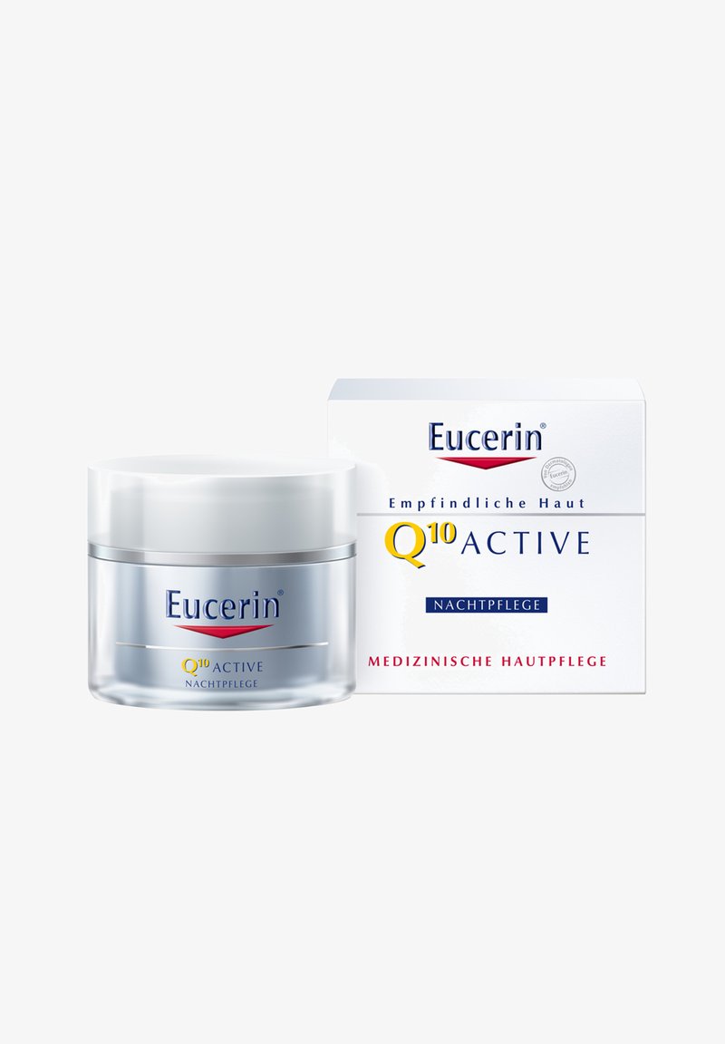 Eucerin Q10 Active night cream jar and box for sensitive skin, labeled medical skincare in German.