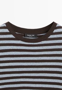 Striped sweater featuring alternating light blue and dark brown stripes, with a ribbed round neckline. Label reads "Massimo Dutti."