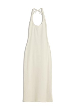 Knit dress in cream, featuring a halter neck with adjustable ties, a mid-length cut, and a smooth, textured fabric. No patterns or accents.